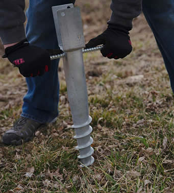 Manual high toque driver for ground screw installation.