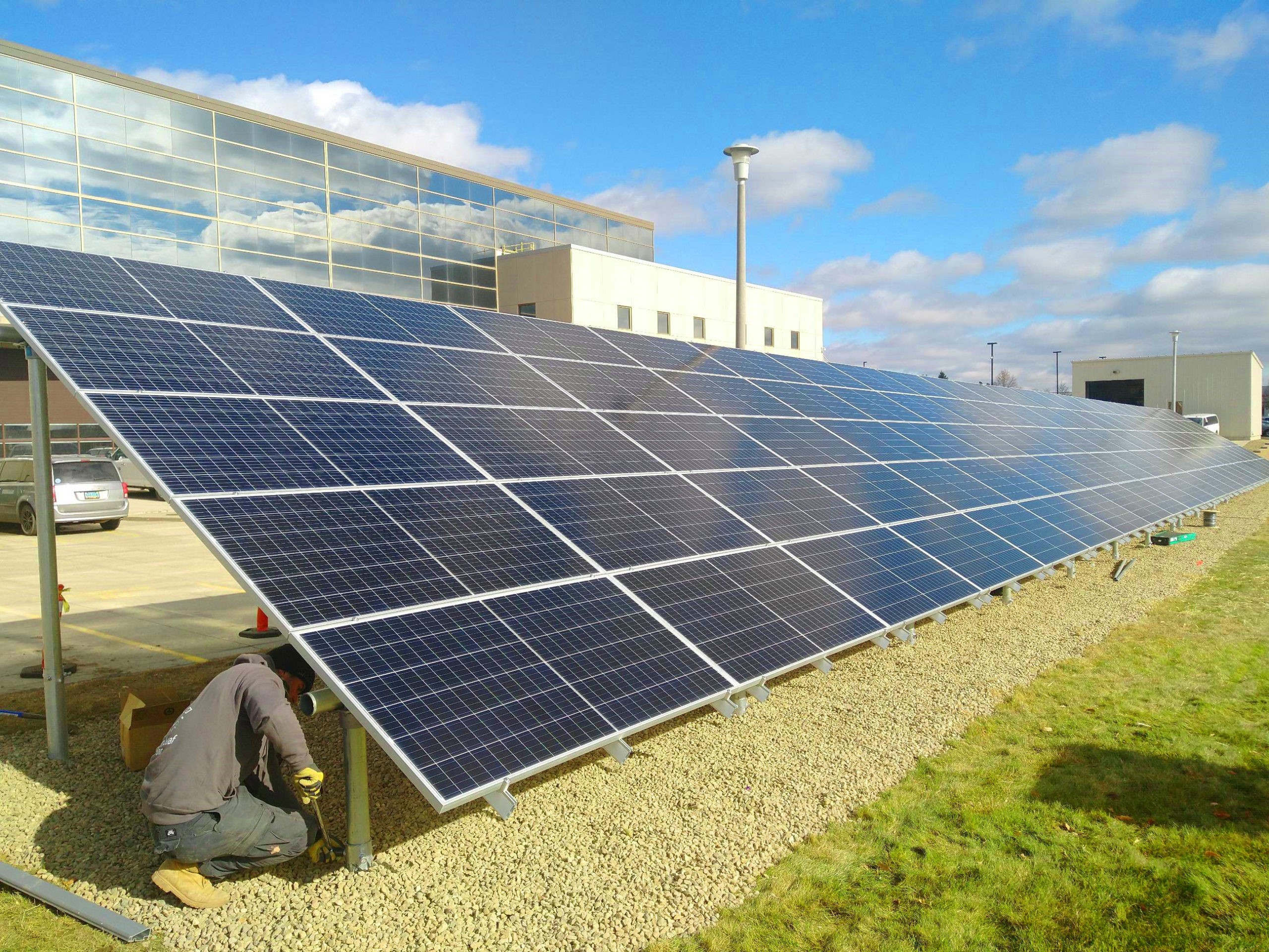 Large solar panel setup being installed.